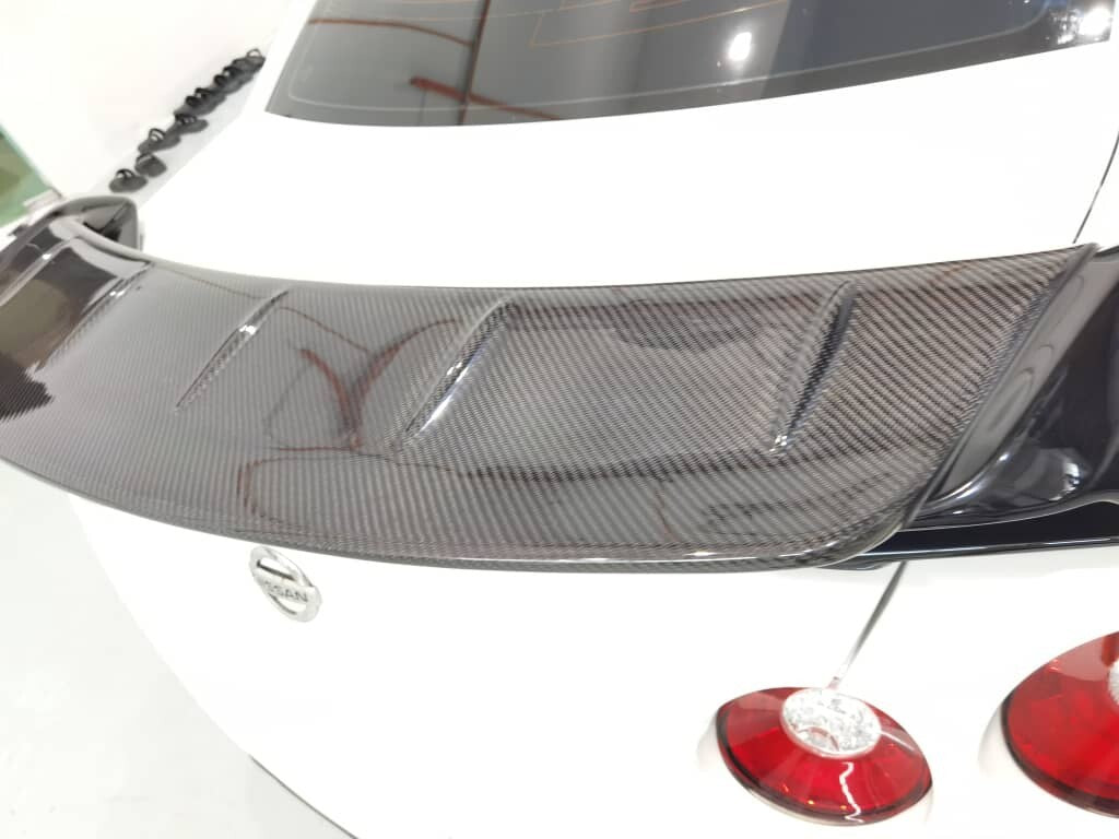 Fit For Nissan GTR R35 Carbon Fiber Rear wing Flap (Stick on to OEM Spoiler)